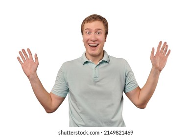 Funny smiling guy in mint T-shirt showing palms of hands, unexpected surprise gesture isolated on white background. Attractive happy man, pleasant meeting, unexpectedly good news