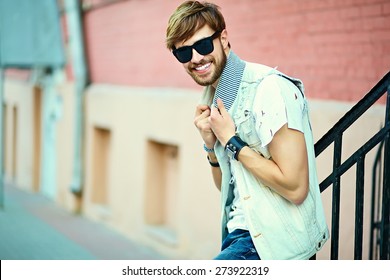 Funny Smiling Hipster Handsome Man Guy In Stylish Summer Cloth In The Street In Sunglasses