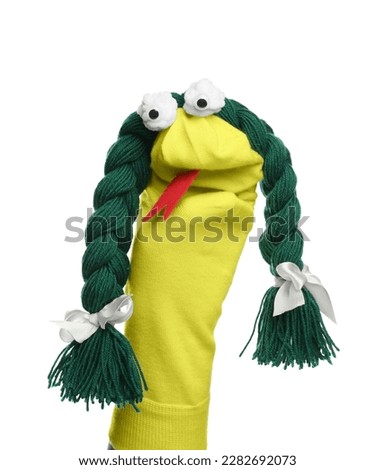 Funny sock puppet with braids isolated on white