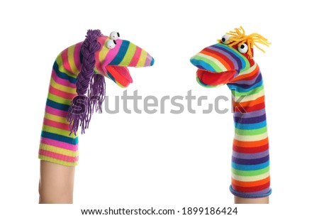 Funny sock puppets for show on hands against white background
