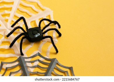 Funny spider from egg carton packaging, step by step instruction. Finished work. Children's craft for Halloween party. Simple DIY, creative eco friendly idea, reuse  and zero waste concept.
