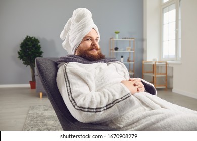 Funny Strange Fat Bearded Man In A Bathrobe Does Spa Treatments On His Face Rests In A Room