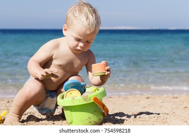 Funny Toddler Playing Sand On Beach Stock Photo (Edit Now) 754598218 ...