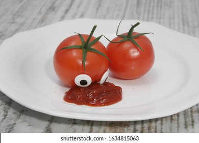 funny tomato is falling down in Ketchup funny kids food