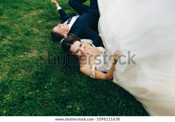 Funny Wedding Couple Falls On Green Stock Photo Edit Now 1098111638