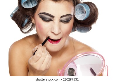 Funny Woman With Curlers And Bad Makeup