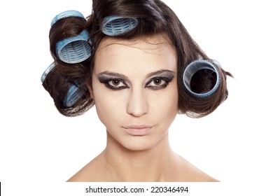 Funny Woman With Curlers And Uncompleted Bad Makeup