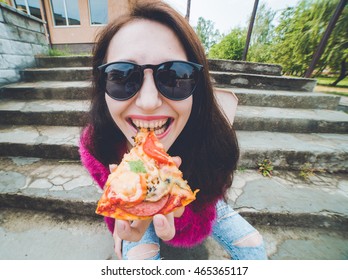 Funny Woman Eating Pizza Outdoor . Lifestyle