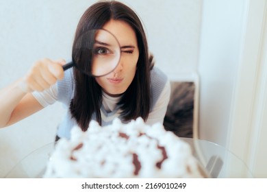
Funny Woman Examining a Birthday Cake with Magnifying Glass. Overly critical food expert analyzing a birthday cake
 - Shutterstock ID 2169010249