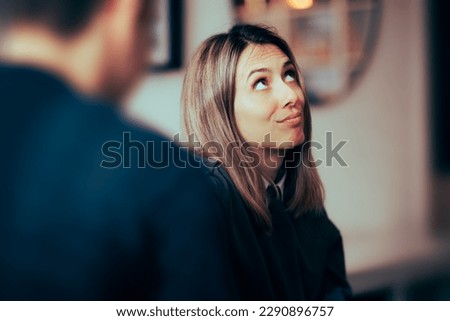 Funny Woman Feeling Bored Talking to her Boyfriend. Wife rolling her eyes at her husband arguments 