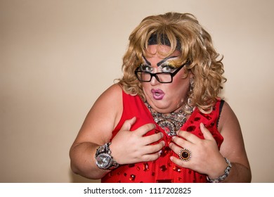 Funny woman with glasses. crossdresser actor.
 