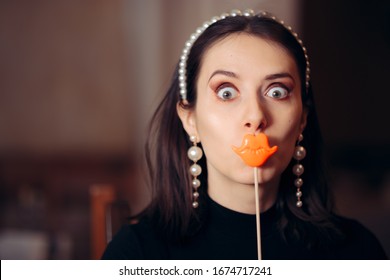 Funny Woman Holding Party Lips Accessory. Silly quirky millennial girl having a sense of humor
