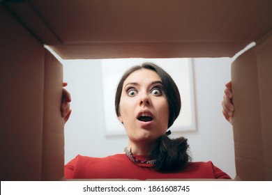 Funny Woman Looking Inside Cardboard Gift Box