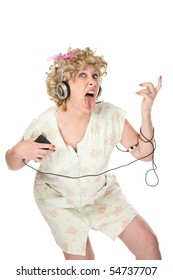 Funny Woman In Nightgown Listening To Music And Dancing