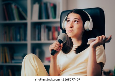 
Funny Woman Singing With At Home Karaoke Microphone. Music Fan Knowing Song Lyrics By Heart Having Fun
