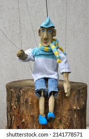 Funny wooden string operated puppet (marionette) from Ukraine