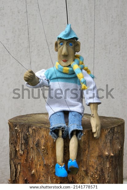 Funny wooden string operated puppet (marionette)\
from Ukraine