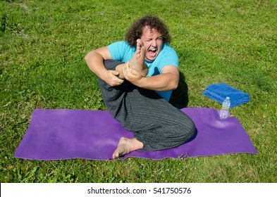 Funny Yoga And Fat Guy On The Nature.