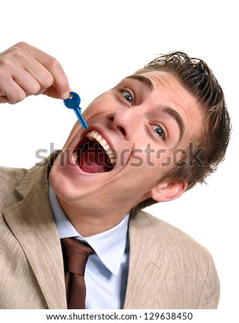 funny-young-businessman-eating-blue-450w