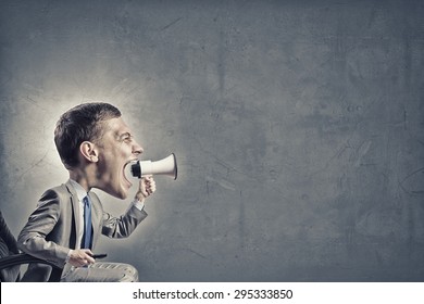 Funny Young Man With Big Head Screaming Emotionally In Megaphone