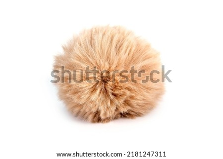 Fur ball isolated on white background. Fluffy Brown of fur ball 