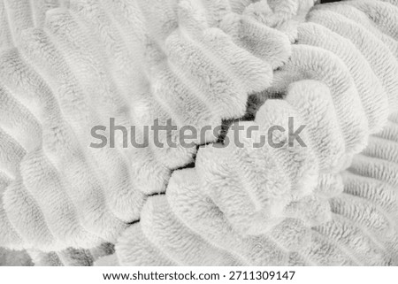 Fur texture background in Cloud Dancer, color 2026 year lofty shade of white.furry texture as fashion design background in trendy color 2026 year Cloud Dancer.Soft plush warm textile elegant aesthetic