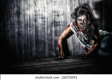 Furious bloody zombie girl. Horror. Halloween. 