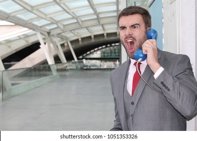 Furious Man Calling By Old School Payphone 