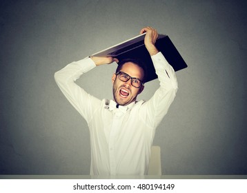 Furious Nervous Business Man About To Smash Throw His Laptop Computer