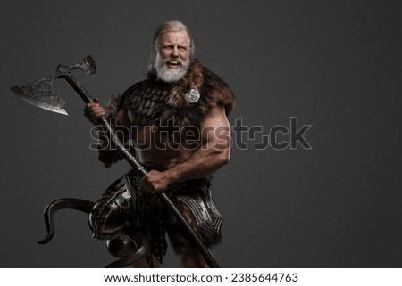 A furious screaming elderly Viking with long white hair and a beard, dressed in fur and light armor against a gray background