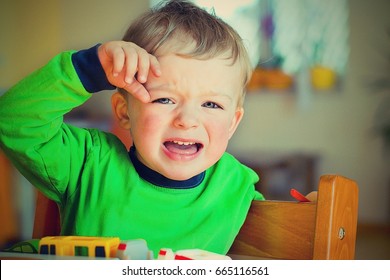 Furious And Upset Toddler In Period Of Defiance. Child Concept.