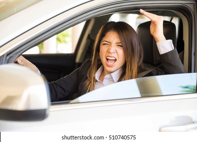 Furious Woman In A Suit Yelling And Cursing To Another Driver And Suffering From Road Rage