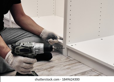 Furniture assembly process. Assembling several pieces of furniture. Do it yourself - Shutterstock ID 1849624300
