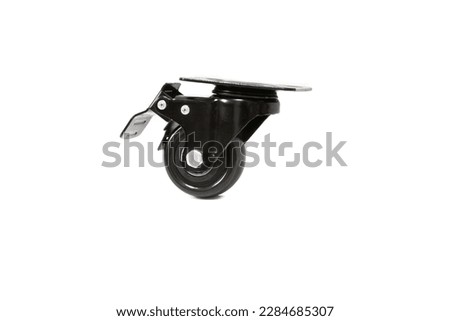 Furniture caster wheels (rubber wheel) made of metal and plastic. Isolated in a white background.