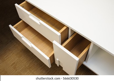 Furniture: Pull Out Empty Drawers Of Modern Sleek Writing Table In Office Cabinet
