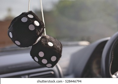 Furry Dice Hanging In Car