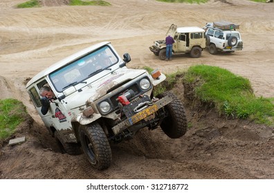 FURSTENAU, GERMANY - MAY 09, 2015: A Toyota 4-wheel drive is driving on a special off the road terrain for land cruisers and vehicles in Germany