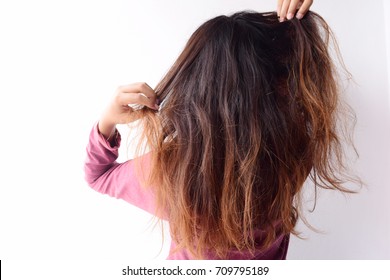 Fury And Big Anger Inside Of People. Blonde Furious Woman Pulling Blonde Hair Out Of Head. Emotional Young Girl Showing Her Bad Expression, Motion Portrait,blurred Picture