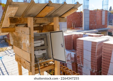 Fuse box, control panel with automatic fuses and sockets, electrical control panel enclosure for power and distribution electricity on the building site.