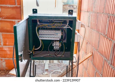 Fuse box, control panel with many various wires and fuses, electrical control panel enclosure for power and distribution electricity on the building site.