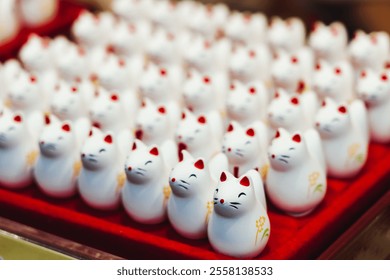 Fushimi Inari Taisha Shrine, Fushimi-ku, Kyoto Prefecture, Kansai region, Kyoto, Japan, Shinto shrine, mountain way with red torii gates tunnel, wooden torii path, fox sculptures, travel to Japan - Powered by Shutterstock