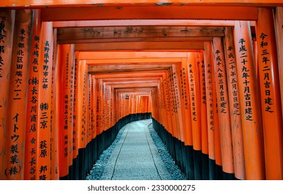 Fushimi Inari-taisha Gate(Fushimiinari-taisha) to heaven, Kyoto, Japan  (The Japanese text mean :bless you) - Powered by Shutterstock