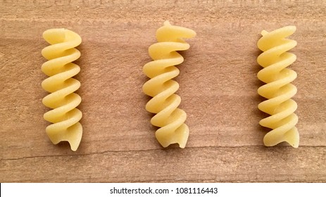 Fusilli on the wood board - Powered by Shutterstock