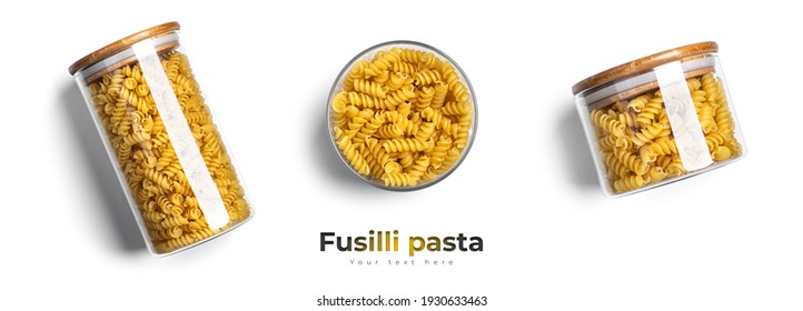 Fusilli pasta in a glass jar isolated on a white background. High quality photo - Powered by Shutterstock