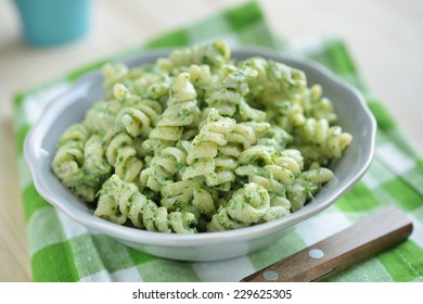 Fusilli Pasta With Spinach And Ricotta Cheese In A Bowl