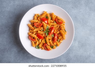 Fusilli pasta, spiral or spirali pasta with tomato sauce - Italian food style