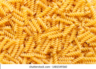 Fusilli spaghetti pattern background. Fusilli background.