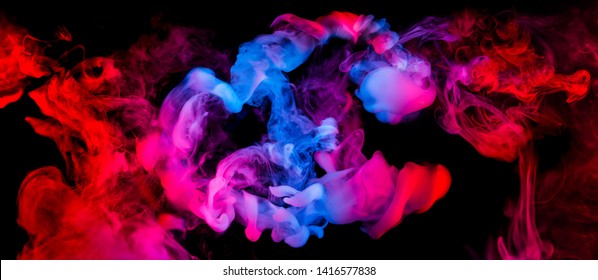 fusion of blue and red smoke in motion isolated on black background - Shutterstock ID 1416577838