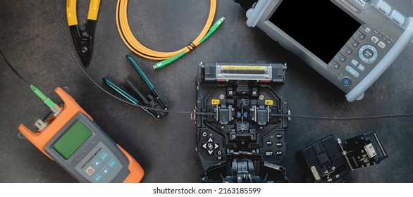 Fusion Splicing Tool, a set of fiber-optic or fiber-optic splicers for high-speed Internet connections. - Shutterstock ID 2163185599