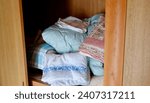 Futon in a closet in a Japanese house.